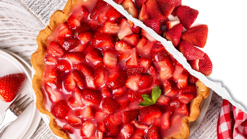 A strawberry gelatin pie featuring raw sliced strawberries. 