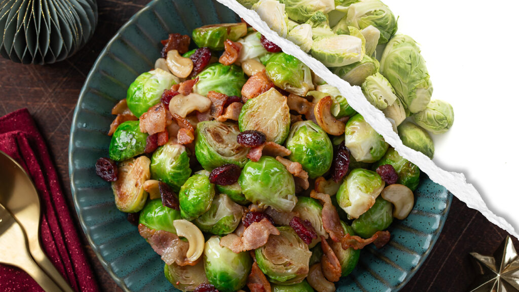 A plated dish of roasted Brussels sprouts, cranberries and cashews featuring raw brussels sprouts. 