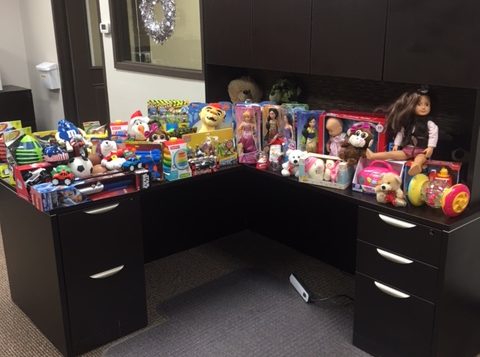 Part of FreshPoint Dallas' holiday toy donation to The Family Place.